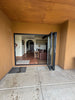 Looking inside a Mesa area home through high quality Outlook Folding doors