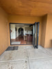 Looking inside a Mesa area home through high quality Outlook Folding doors